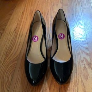 Cole Haan black patent leather small platform pumps, size 10AA